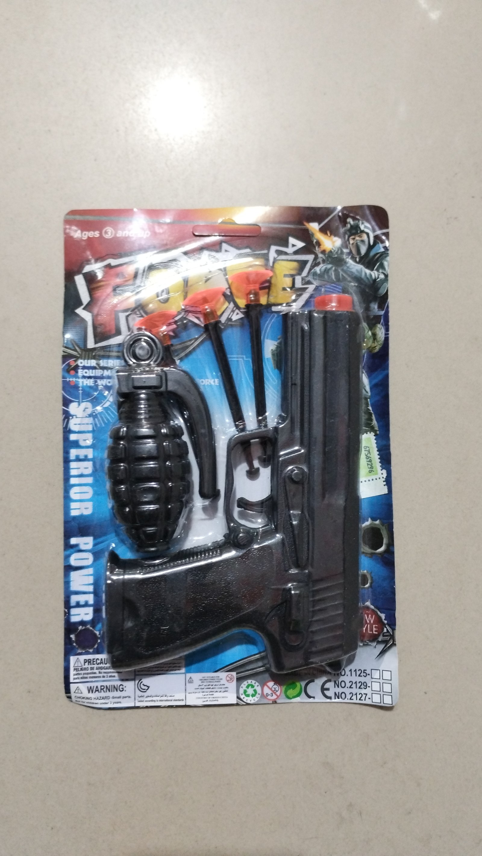 PISTOLA LANZA DARDOS